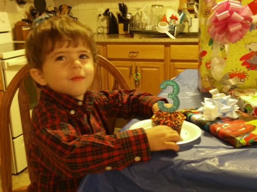 Carter and his number 3 candle
