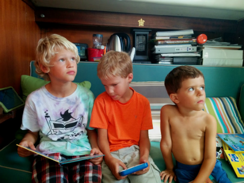 The boys can't resist reading new books!