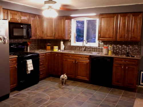 Renovations are a continuous part of our life. One of my favorites was Dan's kitchen masterpiece.