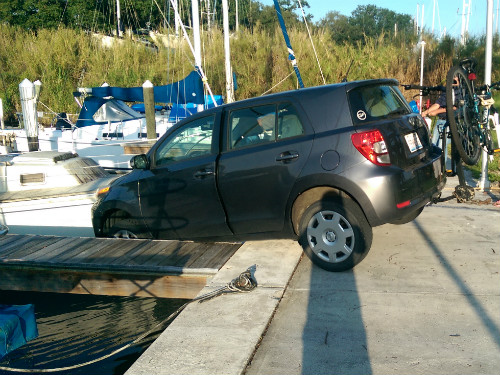 Scion xD hanging over the edge of the docks