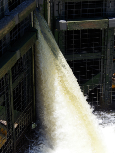 Water pouring in from the high side of the lock.