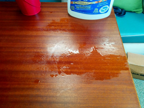 This is our salon table after washing a load. Not a lot of water left over, but enough that I wouldn't do it on the bed or carpet.