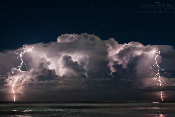 Thunderstorm over the Atlantic Ocean, off the coast of Ormond Beach, Florida. Taken by Jason Weingart. 